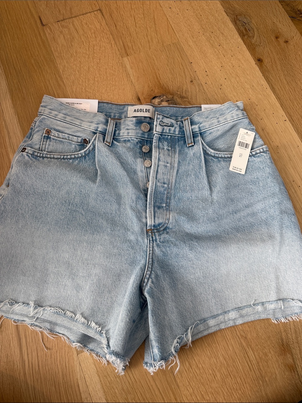 Agolde Rhoda pleated A line short Light Blue Raw Hem Denim Shorts
